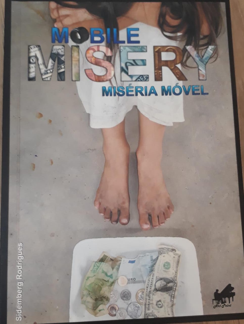 Mobile misery = miséria móvel / 2008